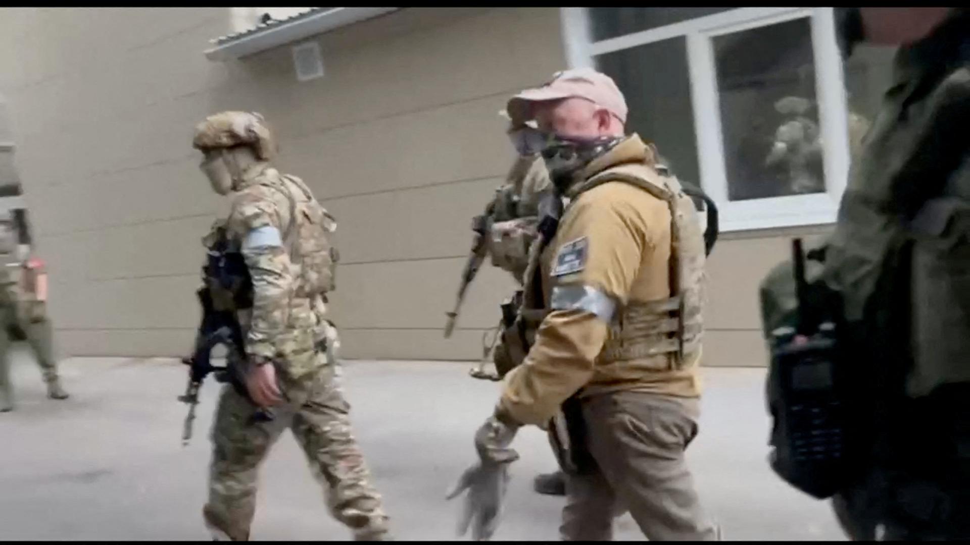 Founder of Wagner private mercenary group Yevgeny Prigozhin and Russian Wagner Group fighters are seen at the headquarters of the Southern Military District of the Russian Armed Forces in Rostov-on-Don, Russia, in this screen grab from a video released on June 24, 2023. Video Obtained by REUTERS. THIS IMAGE HAS BEEN SUPPLIED BY A THIRD PARTY. NO RESALES. NO ARCHIVES. Photo: VIDEO OBTAINED BY REUTERS/REUTERS