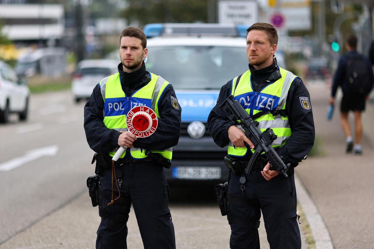 German police officers conduct random checks at a border with France, in Kehl