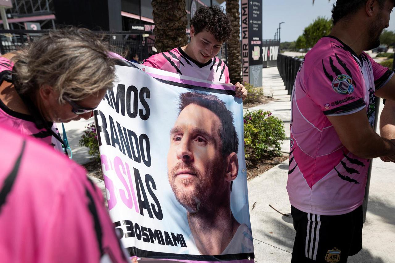 Supporters of Argentinian soccer player Leo Messi gather outside the Inter Miami DRV Pnk Stadium, in Fort Lauderdale