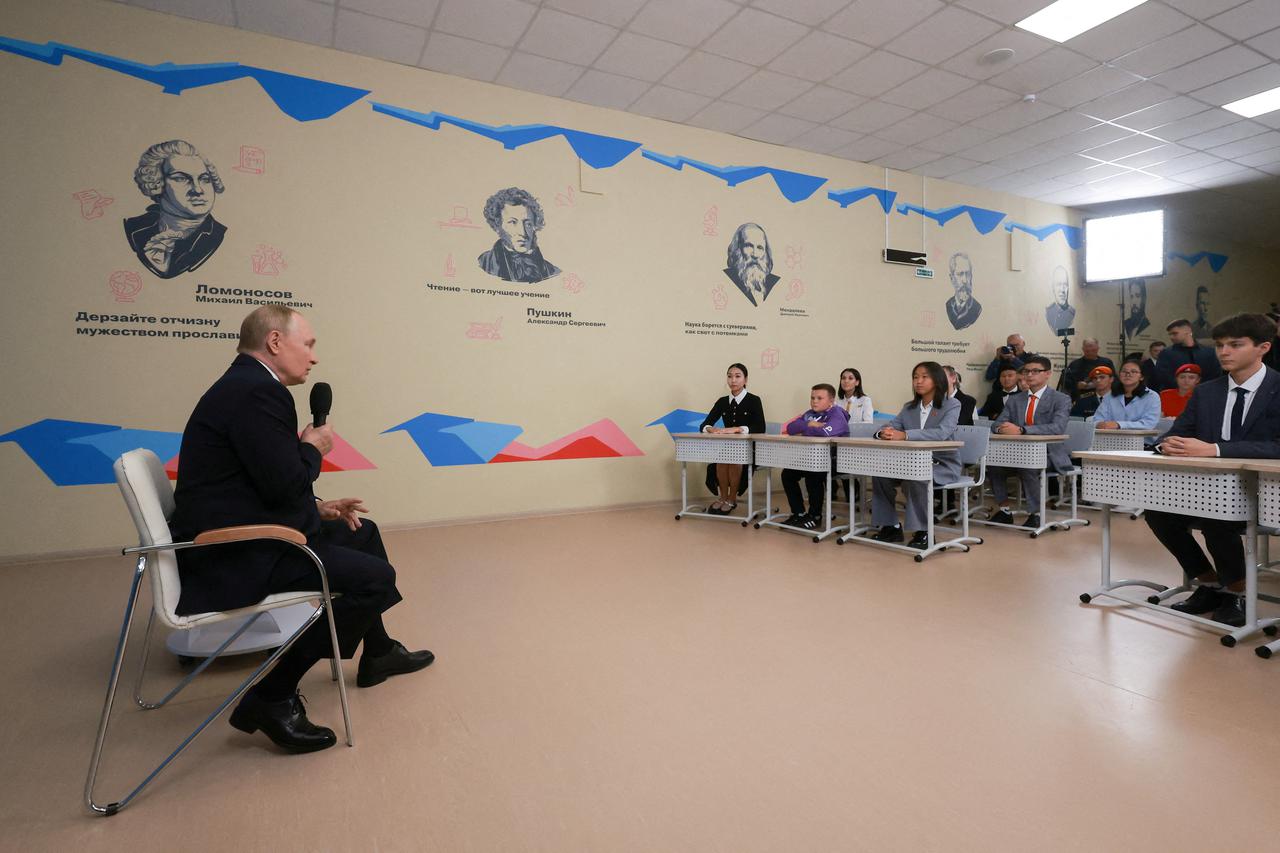 FILE PHOTO: Russian President Putin delivers a lesson at Kyzyl school