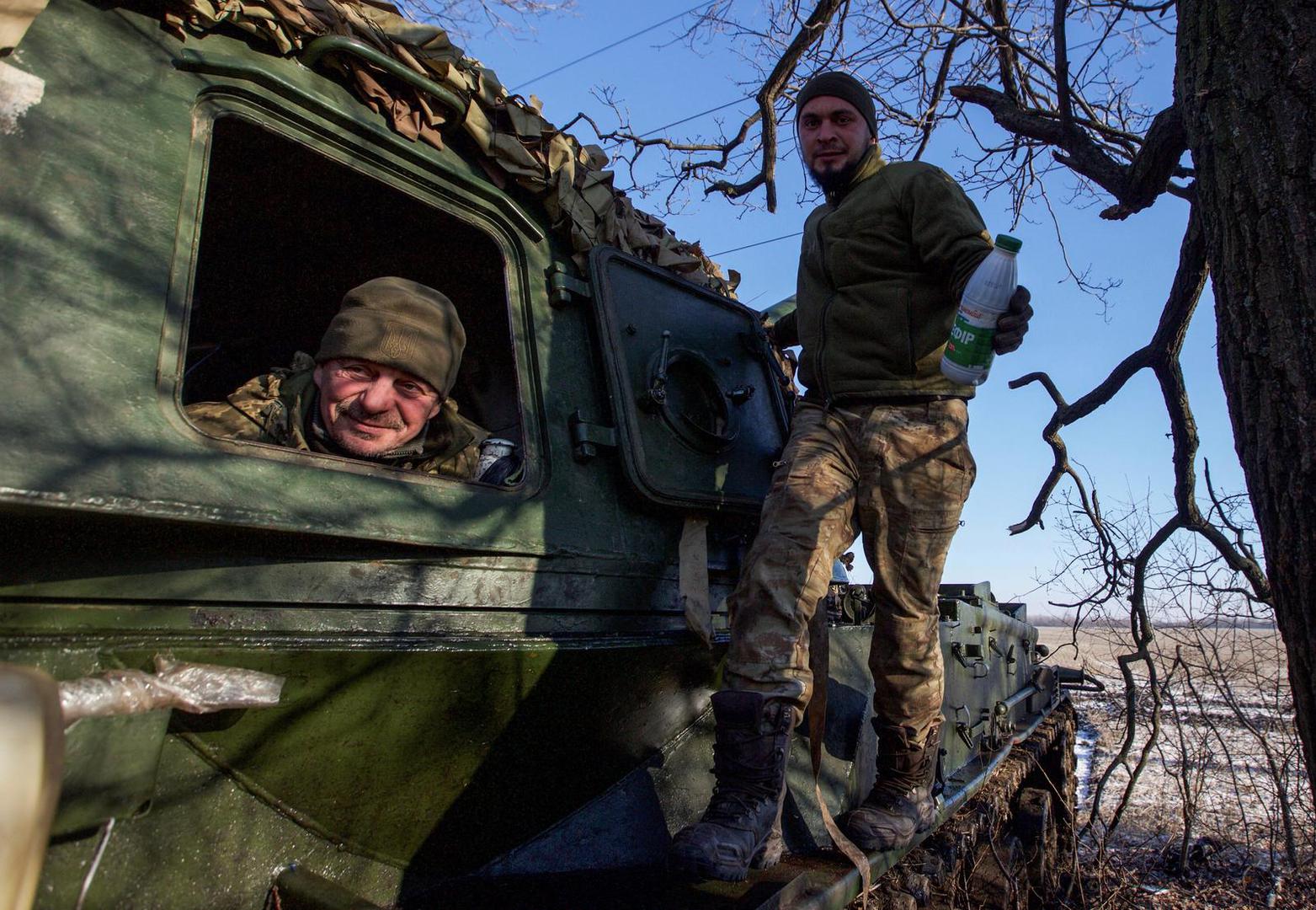 Ukrainian servicemen look on from a 2S3 Akatsiya self-propelled howitzer at their position in a frontline, amid Russia's attack on Ukraine, in Donetsk region, Ukraine January 8, 2023. REUTERS/Anna Kudriavtseva Photo: Stringer/REUTERS