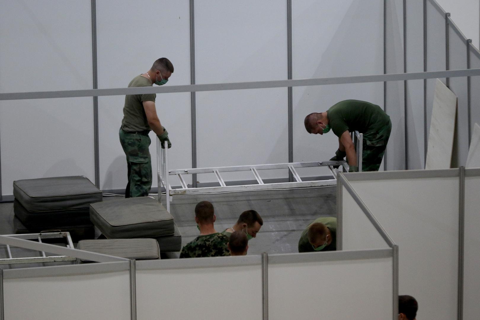 06, July, 2020, Belgrade - The Ministry of Health and the Army of the Republic of Serbia are setting up military beds in the Stark Arena to form a temporary covid hospital for people who have mild symptoms of the coronavirus. Photo: Antonio Ahel/ATAImages/PIXSELL

06, jul,2020, Beograd - Ministarstvo zdravlja i Vojska Republike Srbije namestaju vojne krevete u Stark areni za formiranje privremene kovid bolnice za ljude koji imaju blaze simtome korona virusa. Photo: Antonio Ahel/ATAImages/PIXSELL