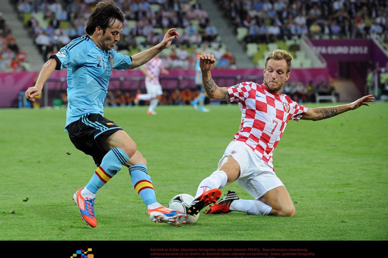 'Spain\'s David Silva (left) and Croatia\'s Ivan Rakitic battle for the ball Photo: Press Association/Pixsell'
