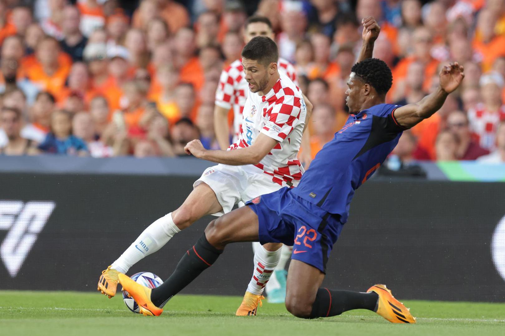 14.06.2023., stadion Feyenoord "De Kuip", Rotterdam, Nizozemska - UEFA Liga Nacija, polufinale, Nizozemska - Hrvatska. Andrej Kramaric, Denzel Dumfries Photo: Luka Stanzl/PIXSELL