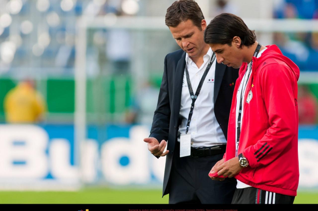 '29.05.2011, Rhein-Neckar-Arena, Sinsheim, GER, LS FSP, Deutschland (GER) vs Uruguay (UY), im Bild Sami Khedira of Germany and Oliver Bierhoff Manager of the german Team during the Football Friendly S