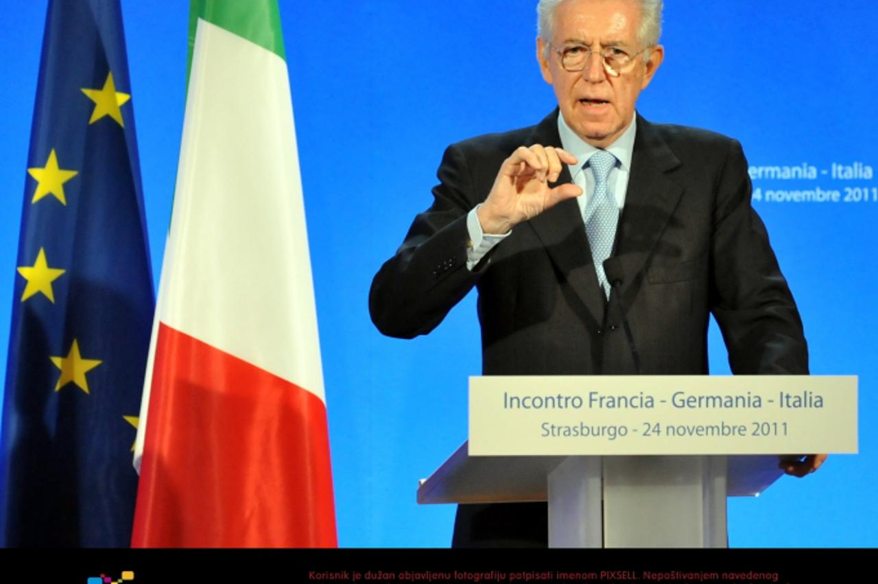 'Italian Prime Minister Mario Monti speaks during a press conference in Strasbourg, France, 24 November 2011. French President Nicolas Sarkozy, German Chancellor Angela Merkel and Italian Prime Minist