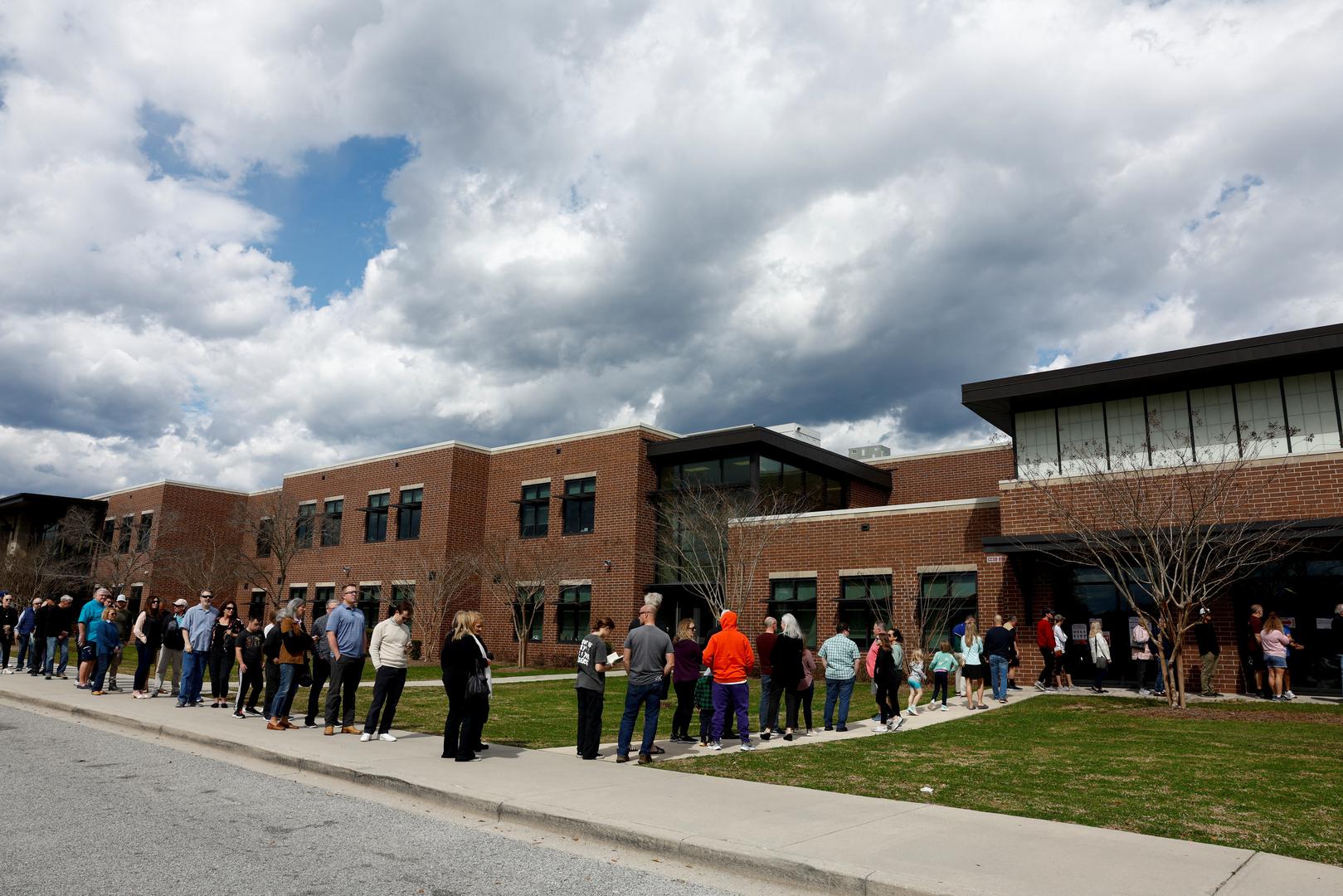 People stand in line to cast their votes in the South Carolina Republican presidential primary election, at the Jennie Moore Elementary School, in Mount Pleasant, South Carolina, U.S., February 24, 2024. REUTERS/Evelyn Hockstein Photo: Evelyn Hockstein/REUTERS