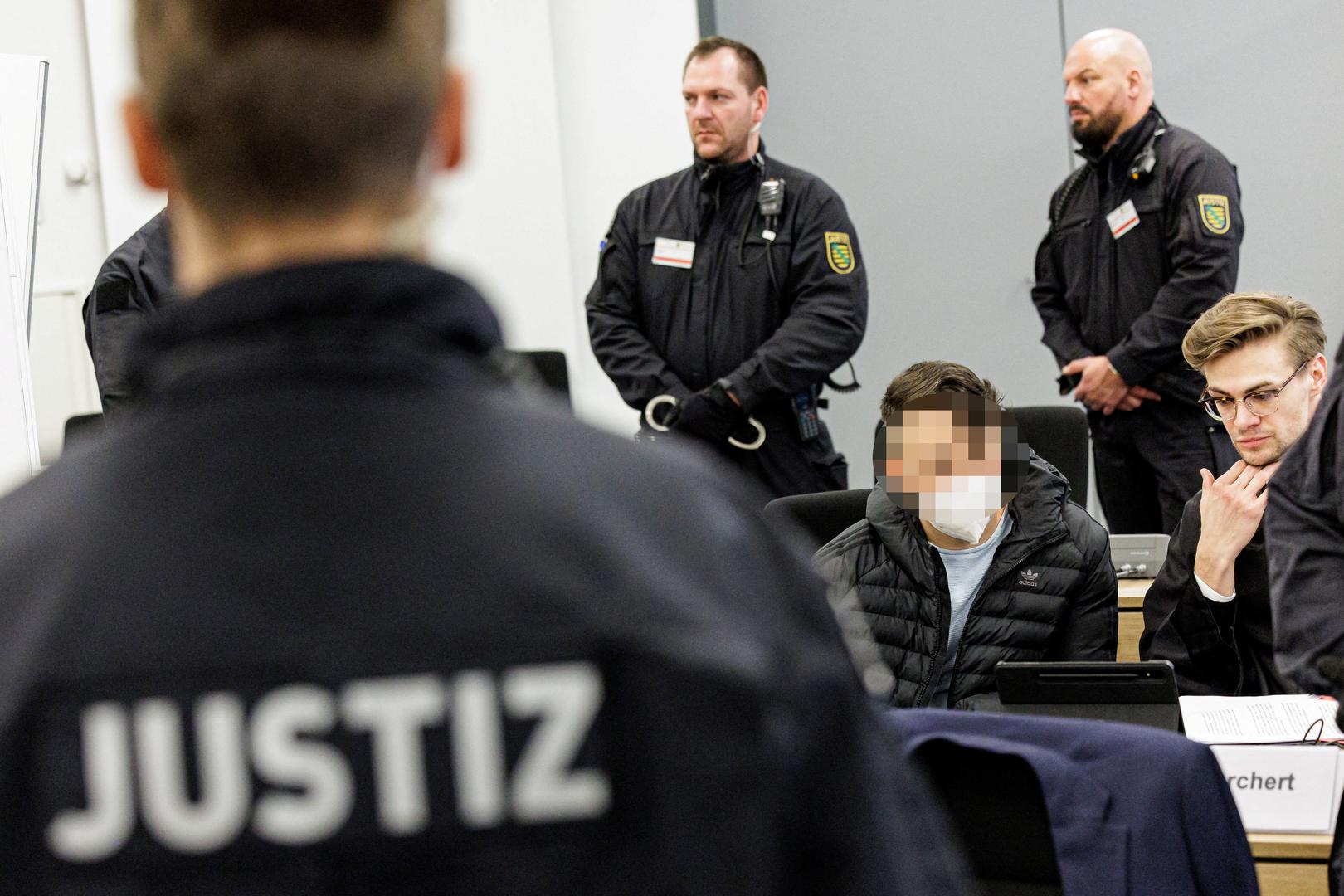 Defendant Bashir R. sits next to his lawyer in the courtroom of the Higher Regional Court prior to a hearing in the trial over a November 2019 jewellery heist on the Green Vault (Gruenes Gewoelbe) museum in Dresden's Royal Palace, in Dresden, Germany, March 20, 2023. Jens Schlueter/Pool via REUTERS IMAGE PIXELLATED AT SOURCE. GERMAN COURT REQUESTS THAT THE FACE OF THE DEFENDANT MUST BE MADE UNRECOGNISABLE Photo: POOL/REUTERS