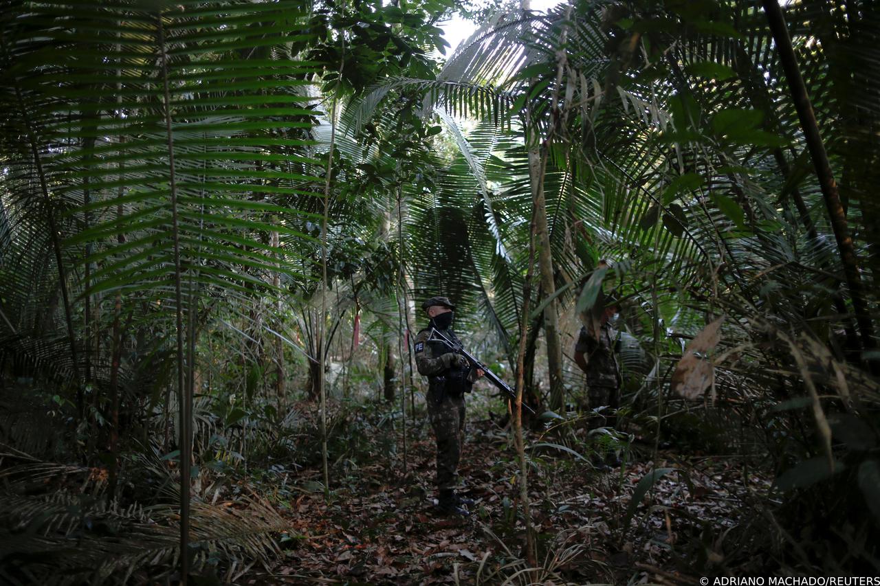 Brazilian Army soldiers are pictured in a forest of wood extraction in the Amazon rainforest