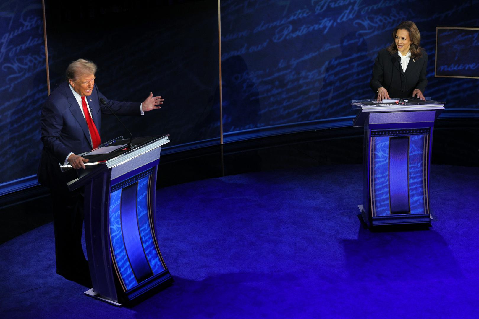 Republican presidential nominee, former U.S. President Donald Trump speaks as Democratic presidential nominee, U.S. Vice President Kamala Harris listens as they attend a presidential debate hosted by ABC in Philadelphia, Pennsylvania, U.S., September 10, 2024. REUTERS/Brian Snyder Photo: BRIAN SNYDER/REUTERS