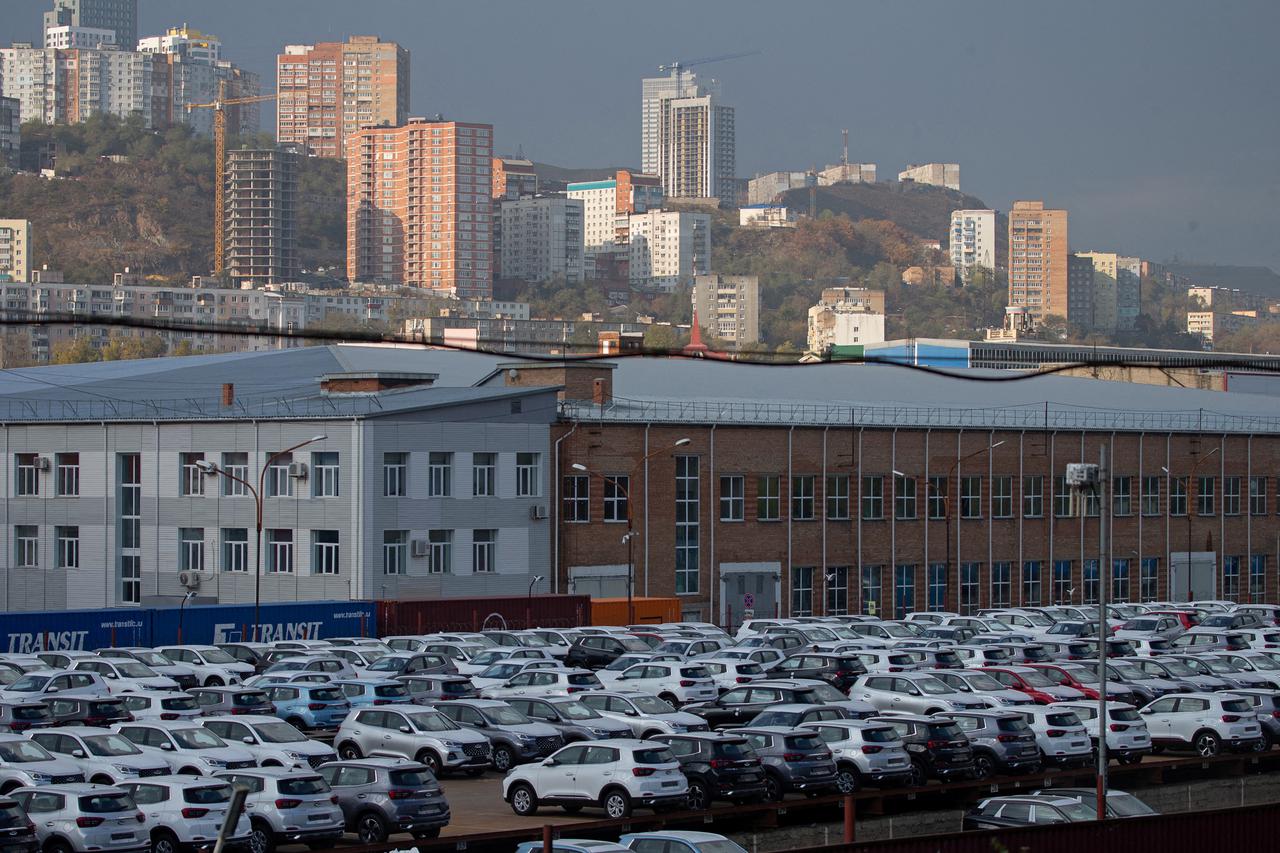 FILE PHOTO: A view shows new cars produced by Chinese automobile manufacturer Chery, in the parking lot of the Sollers plant in Vladivostok