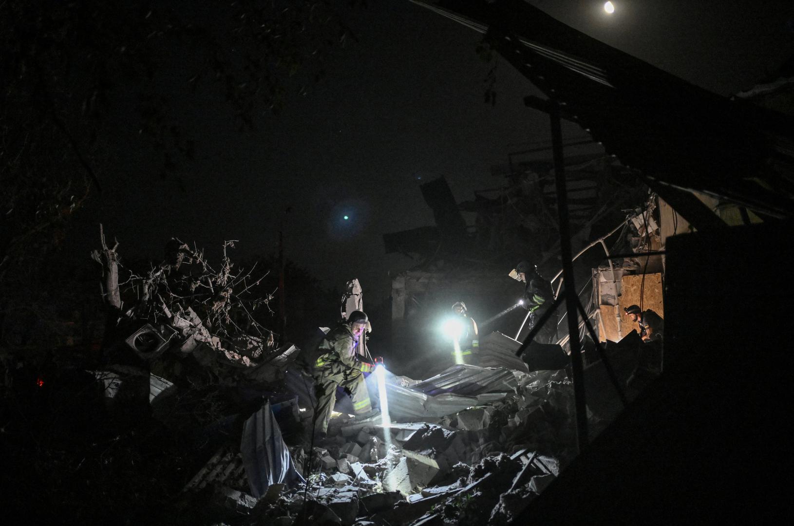 Ukrainian emergency services conduct a search and rescue operation among the rubble of a destroyed hotel following a Russian strike in the town of Kramatorsk on August 24, 2024, amid the Russian invasion of Ukraine. A nighttime Russian strike on a hotel in the eastern Ukrainian city of Kramatorsk wounded two journalists, while a third was missing in the rubble, authorities said Sunday. Vadym Filashkin, head of the Donetsk regional government, said the journalists were British, US and Ukrainian nationals and that a search operation was underway for the missing journalist.      GENYA SAVILOV/Pool via REUTERS Photo: GENYA SAVILOV/REUTERS