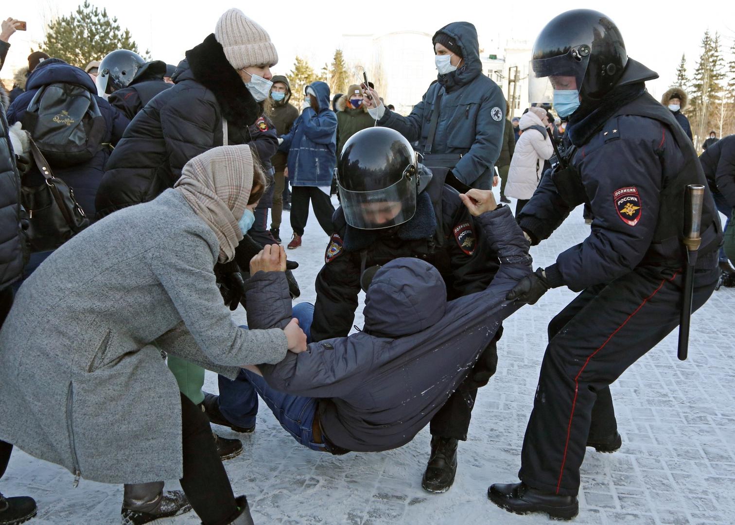 OMSK, RUSSIA - JANUARY 31, 2021: Police officers detain a demonstrator during an unauthorised protest in support of the detained opposition activist Alexei Navalny. Navalny, who had been handed a suspended sentence in the Yves Rocher case in 2014, was detained at Sheremetyevo Airport near Moscow on 17 January 2021 for violating probation conditions. A court ruled that Navalny be put into custody until 15 February 2021. Yevgeny Sofiychuk/TASS Photo via Newscom Newscom/PIXSELL