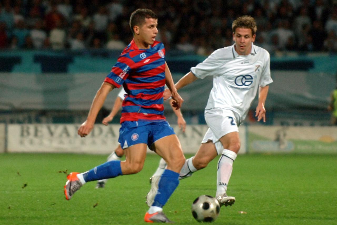 '19.09.2010., Rijeka - Nogometna utakmica 8. kola prve HNL, NK Rijeka - NK Hajduk. Anas Sharbini i Antonio Rukavina Photo: Goran Kovacic/PIXSELL'