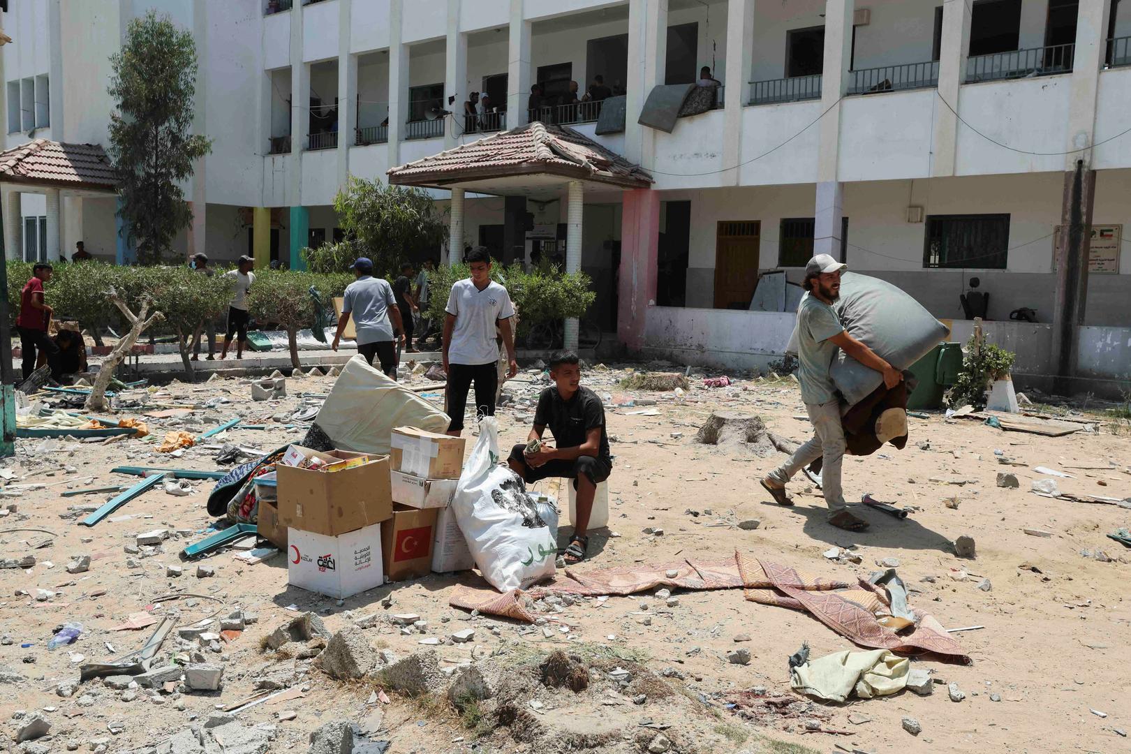 Palestinians leave a school sheltering displaced people following an Israeli strike, amid Israel-Hamas conflict, in Deir Al-Balah in the central Gaza Strip, July 27, 2024. REUTERS/Ramadan Abed Photo: Ramadan Abed/REUTERS