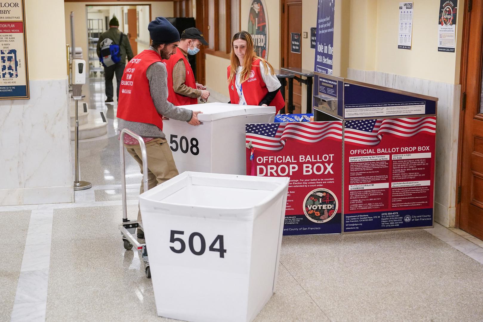 Department of Elections workers transport a box of ballots at the San Francisco City Hall voting center during the Super Tuesday primary election in San Francisco, California, U.S. March 5, 2024. REUTERS/Loren Elliott Photo: LOREN ELLIOTT/REUTERS