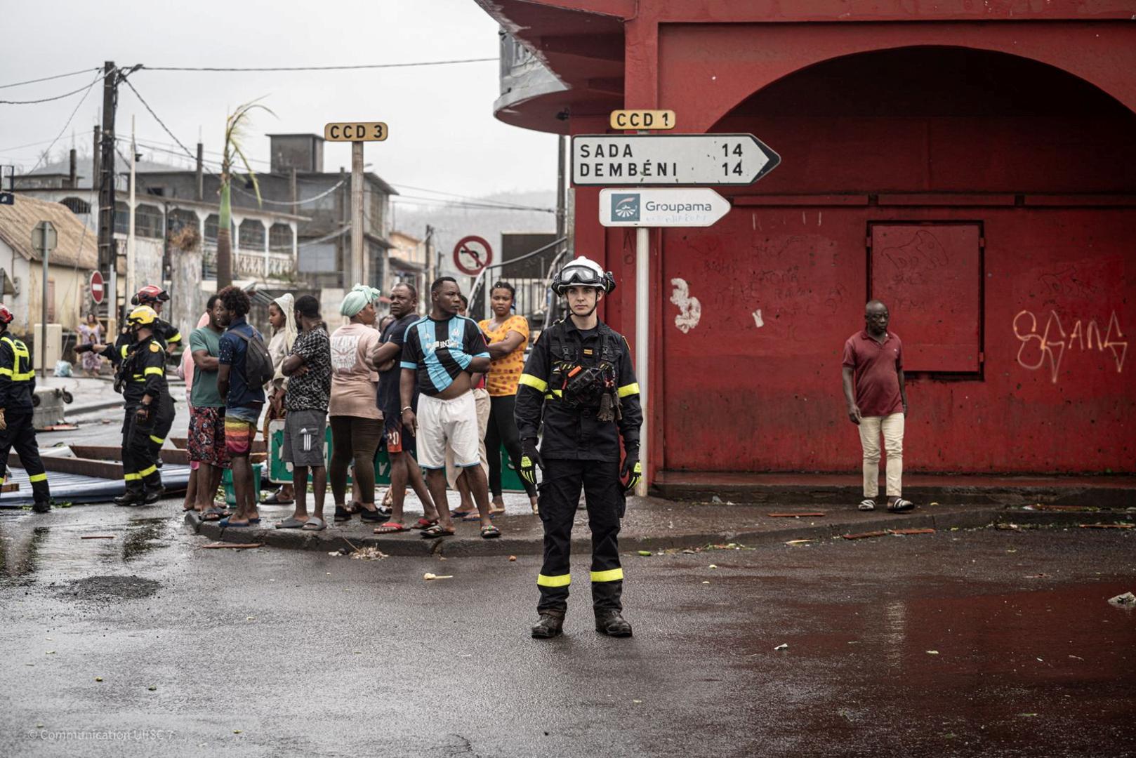 A rescue worker looks on in storm-hit Mayotte, France, in this handout image obtained by Reuters on December 16, 2024. UIISC7/Securite Civile/Handout via REUTERS    THIS IMAGE HAS BEEN SUPPLIED BY A THIRD PARTY. NO RESALES. NO ARCHIVES Photo: UIISC7/Securite Civile/REUTERS