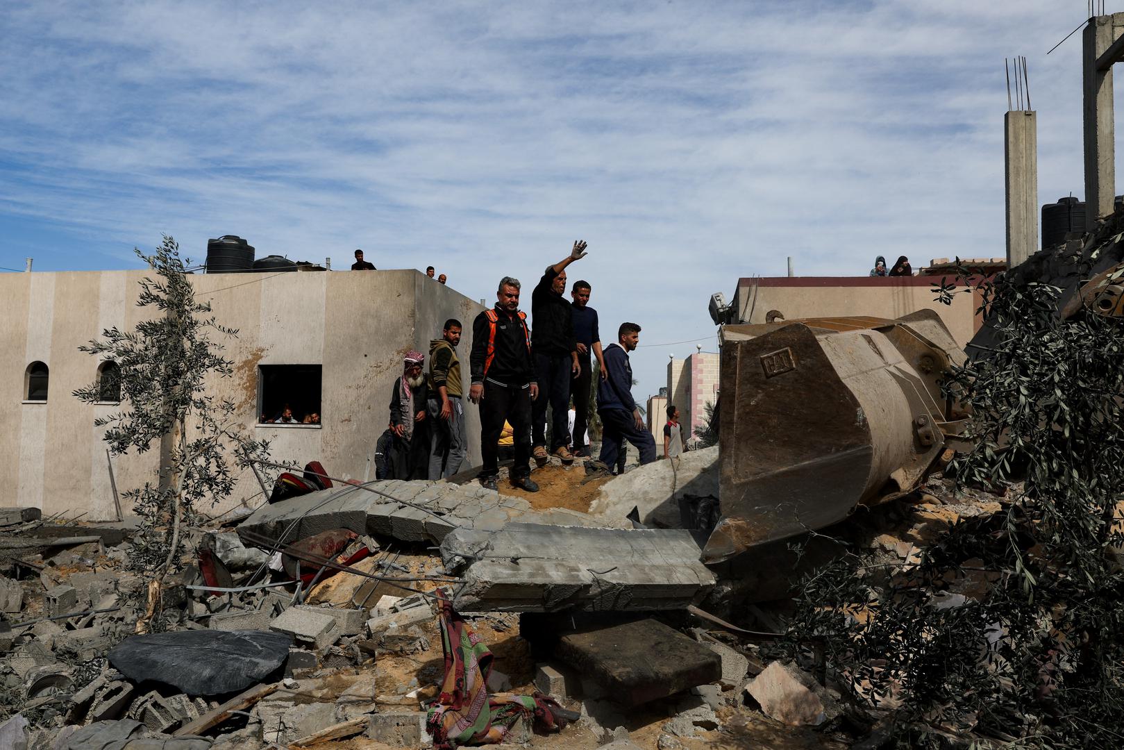 Palestinians gather at the site of an Israeli strike on a house, amid the ongoing conflict between Israel and Hamas, in Rafah in the southern Gaza Strip, March 1, 2024. REUTERS/Ibraheem Abu Mustafa Photo: IBRAHEEM ABU MUSTAFA/REUTERS