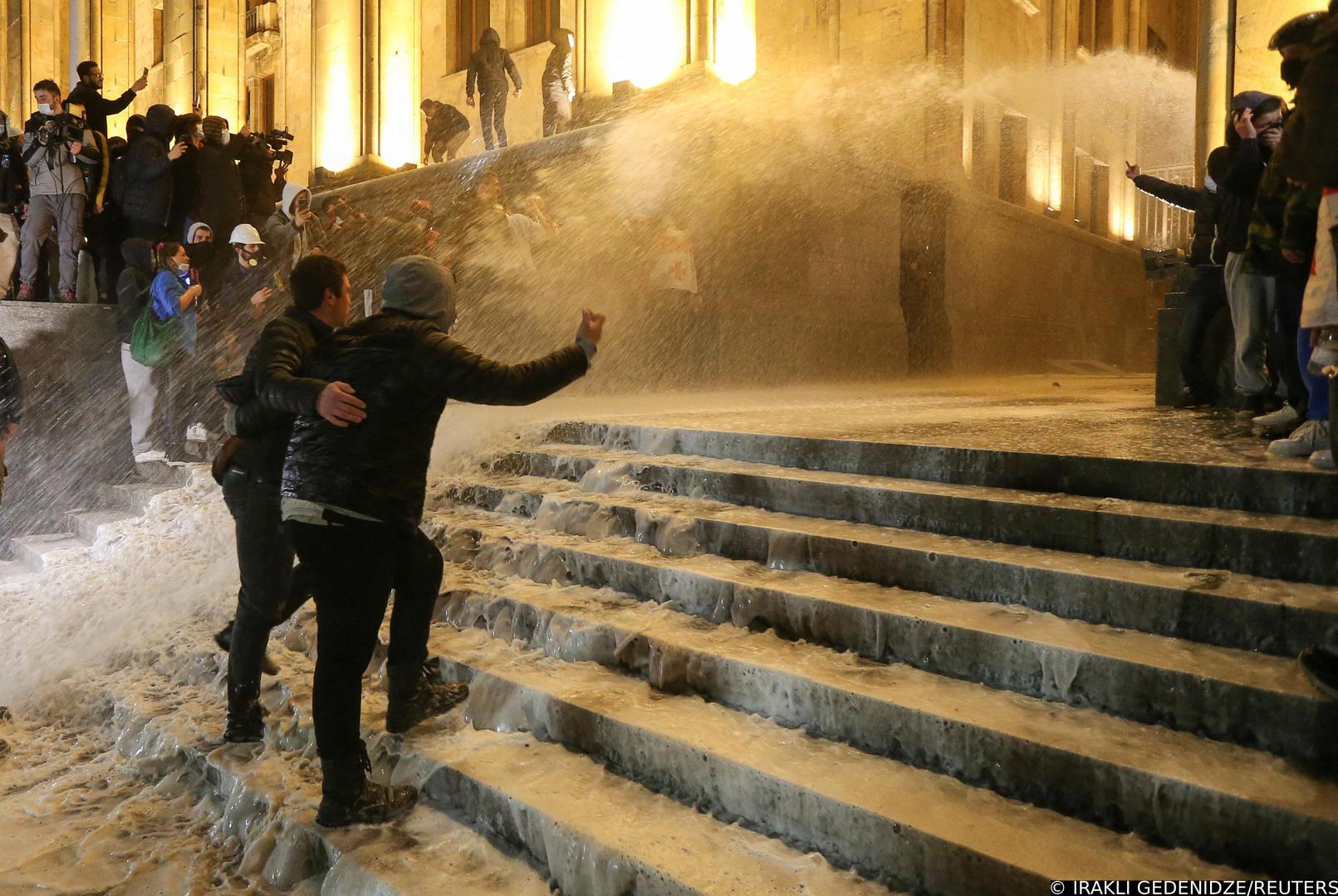 Police use water cannons to disperse protesters outside the parliament building during a rally against the "foreign agents" law in Tbilisi, Georgia, March 8, 2023. REUTERS/Irakli Gedenidze Photo: IRAKLI GEDENIDZE/REUTERS