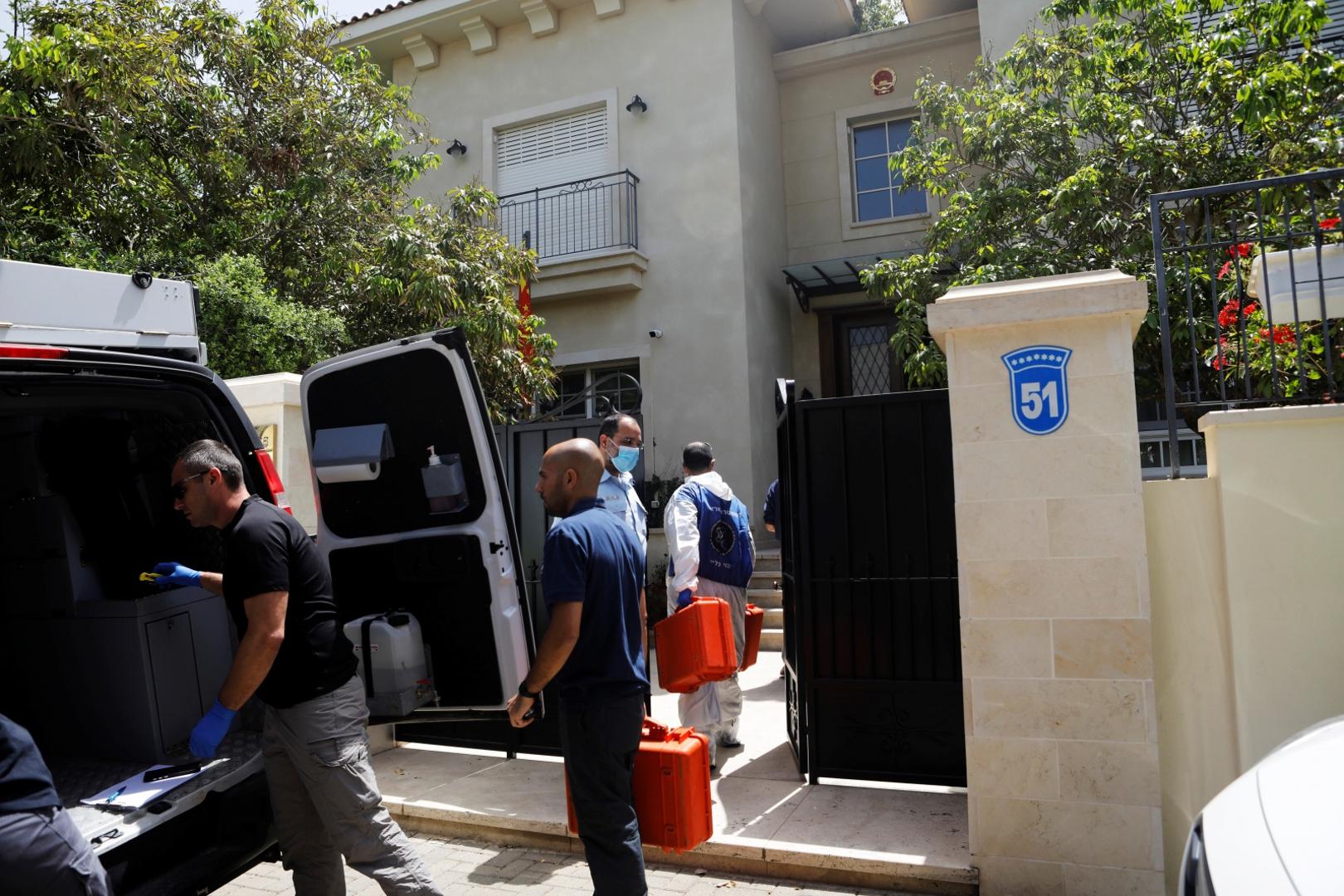 Israeli police forensic experts carry equipment into the house of China's ambassador to Israel, Du Wei, in Herzliya, near Tel Aviv, Israel Israeli police forensic experts carry equipment into the house of China's ambassador to Israel, Du Wei, in Herzliya, near Tel Aviv, Israel May 17, 2020. REUTERS/Nir Elias NIR ELIAS