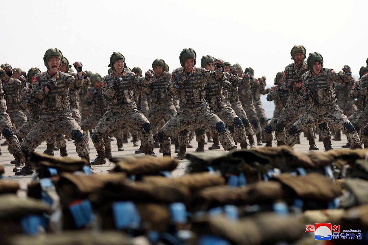 North Korean leader Kim Jong Un guides the training of the Korean People's Army's air and amphibious combat units