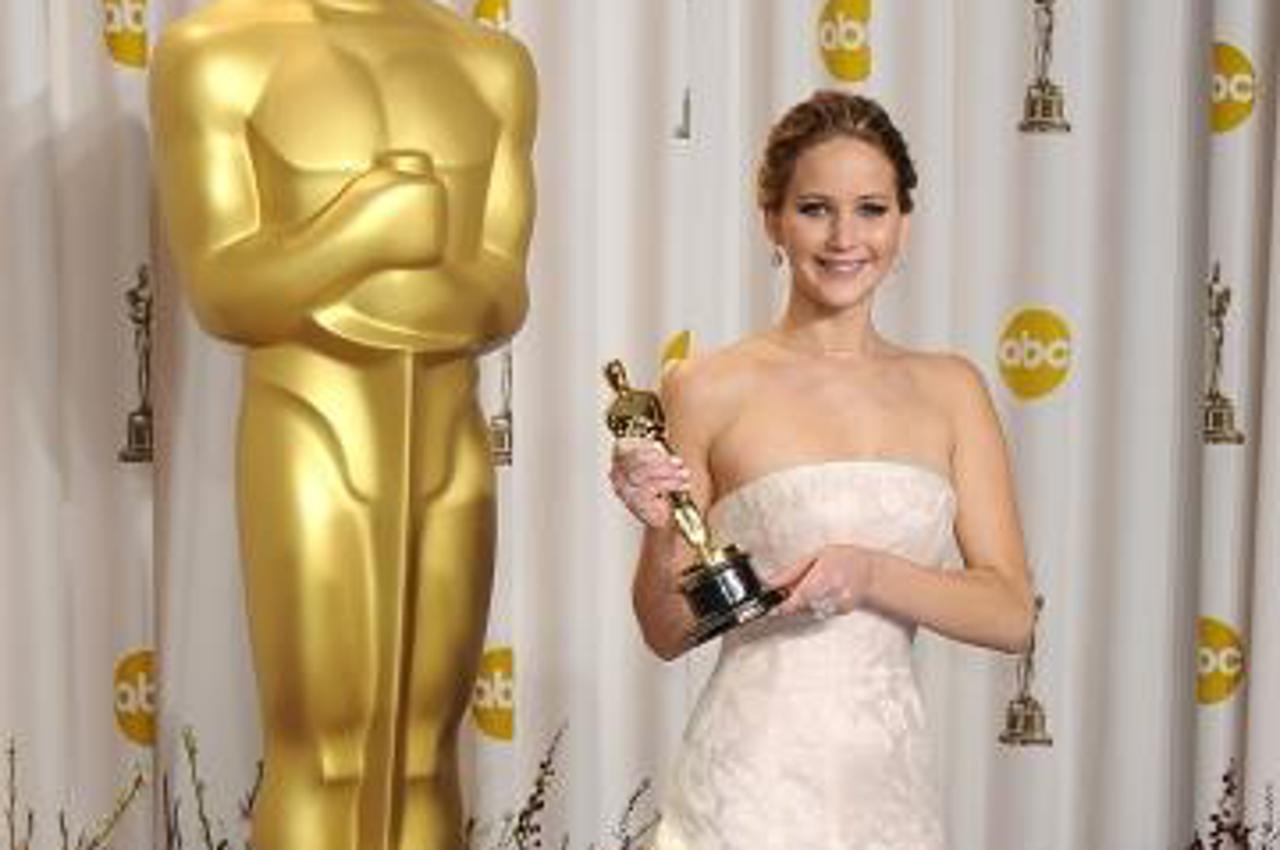 'Jennifer Lawrence with the Oscar for Performance by an Actress in a Leading Role for Silver Linings Playbook at the 85th Academy Awards at the Dolby Theatre, Los Angeles.Photo: Press Association/PIXS