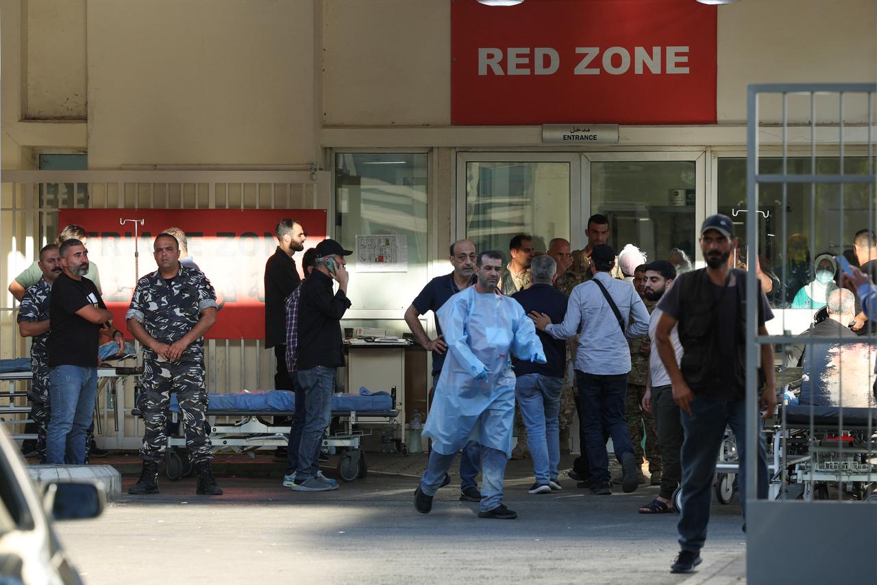 Walkie-talkie devices without batteries are shown at an electronic store, in Sidon