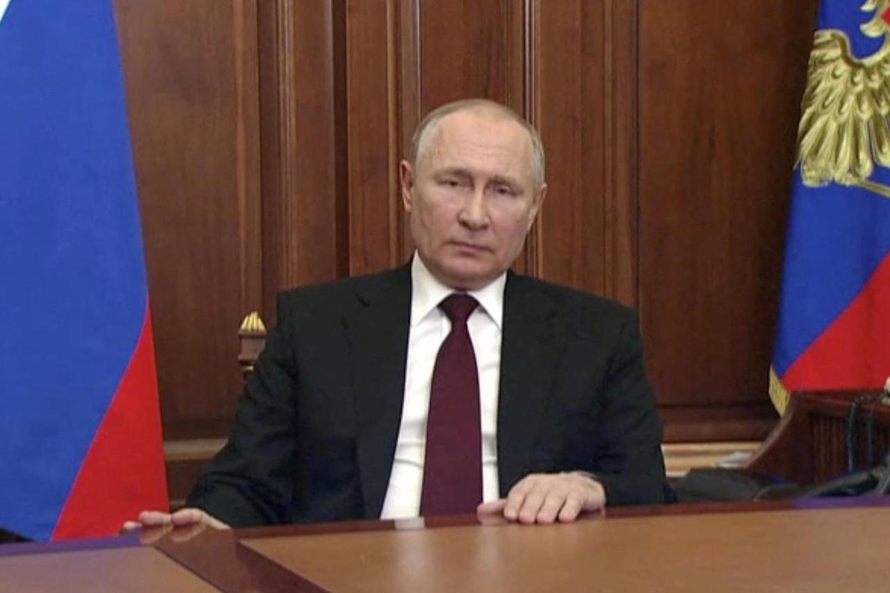 FILE PHOTO: Russian President Vladimir Putin delivers a video address to the nation in Moscow