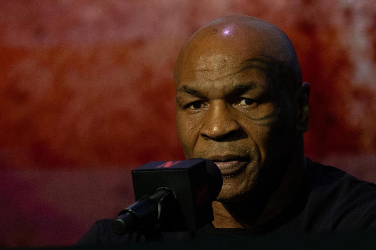 Boxers Mike Tyson and Jake Paul attend a news conference in New York