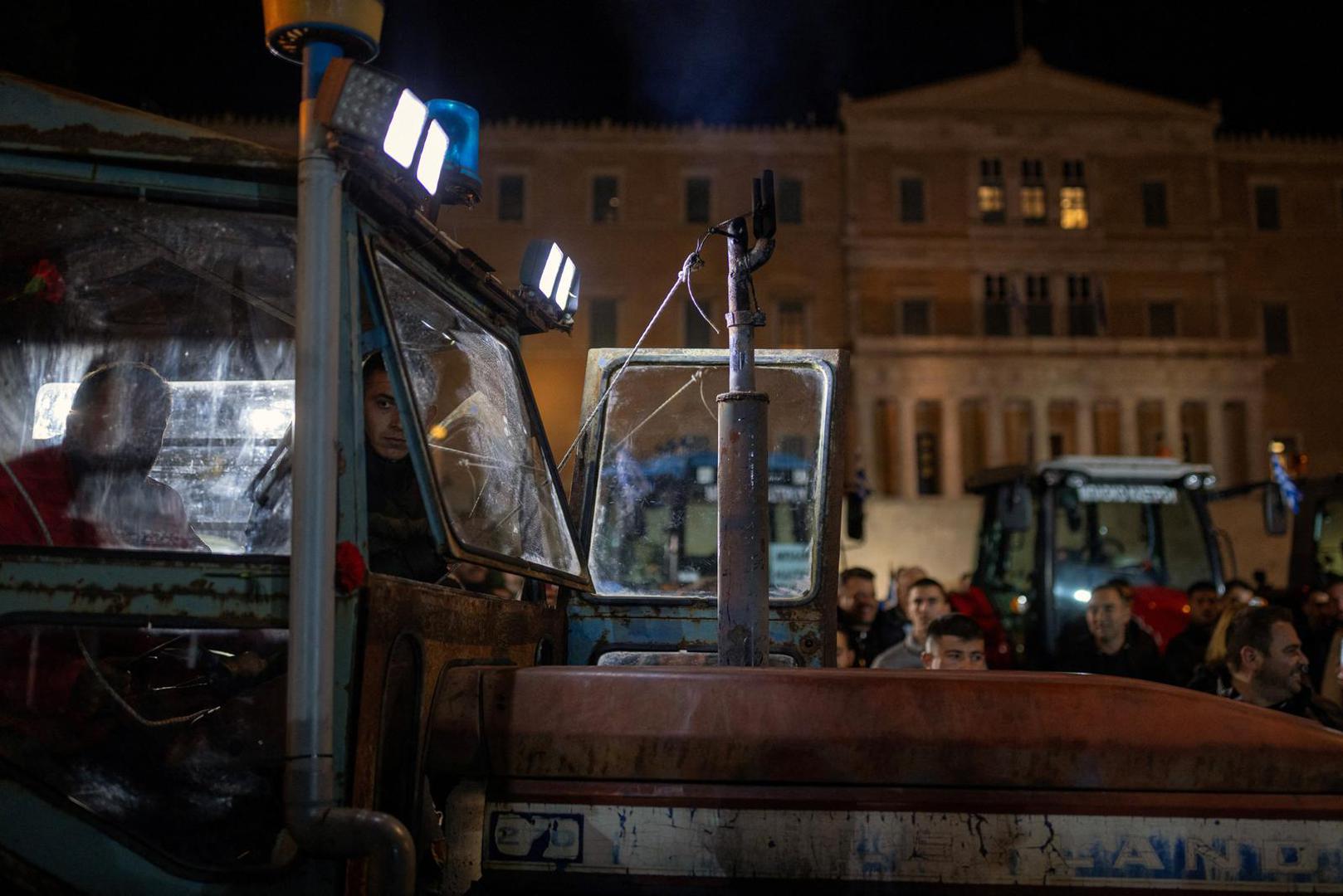 Greek farmers on a tractor take part in a protest over rising energy costs and competition from imports, in front of the parliament building in Athens, Greece, February 20, 2024. REUTERS/Alkis Konstantinidis Photo: Alkis Konstantinidis/REUTERS