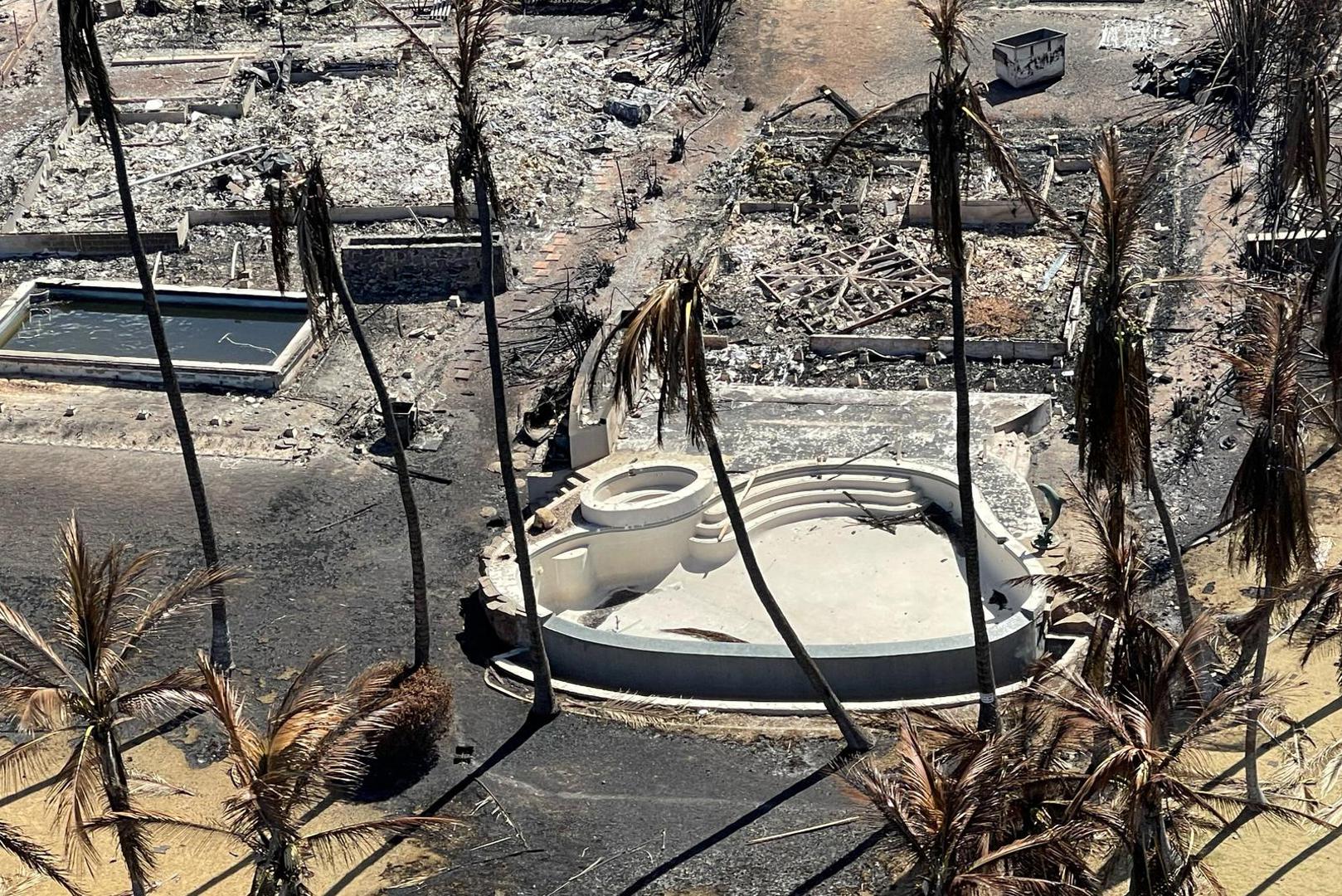 The shells of burned houses, buildings and a pool are left after wildfires driven by high winds burned across most of the town in Lahaina, Maui, Hawaii, U.S. August 11, 2023. Hawai'i Department of Land and Natural Resources/Handout via REUTERS  THIS IMAGE HAS BEEN SUPPLIED BY A THIRD PARTY. Photo: HAWAI'I DLNR/REUTERS