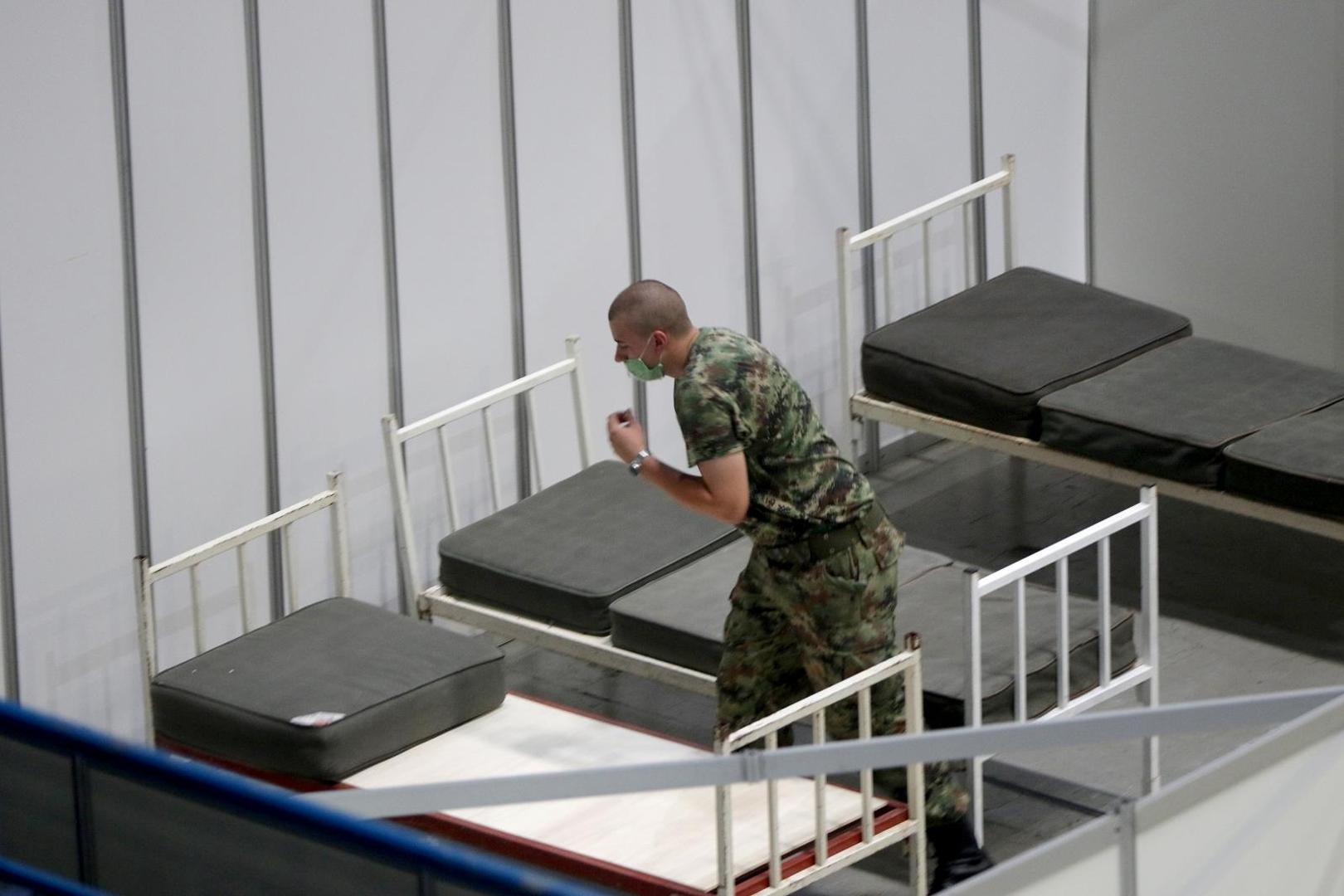 06, July, 2020, Belgrade - The Ministry of Health and the Army of the Republic of Serbia are setting up military beds in the Stark Arena to form a temporary covid hospital for people who have mild symptoms of the coronavirus. Photo: Antonio Ahel/ATAImages/PIXSELL

06, jul,2020, Beograd - Ministarstvo zdravlja i Vojska Republike Srbije namestaju vojne krevete u Stark areni za formiranje privremene kovid bolnice za ljude koji imaju blaze simtome korona virusa. Photo: Antonio Ahel/ATAImages/PIXSELL