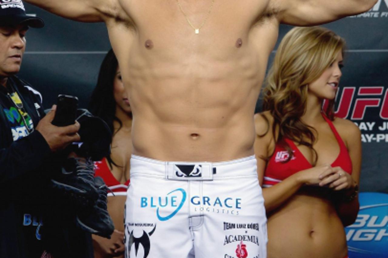 'Junior Dos Santos, of Brazil, poses during the weigh-in for UFC 131 in Vancouver, British Columbia on Friday, June 10, 2011. (AP Photo/The Canadian Press, Darryl Dyck) Photo: Press Association/Pixsel