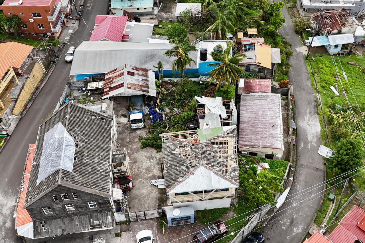 Buildings with damaged roofs are seen in a drone photograph after Hurricane Beryl passed Grenada