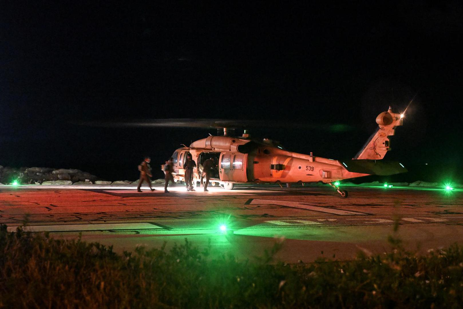 Israeli soldiers enter a military helicopter after it dropped off patients that were injured in a drone attack from Lebanon, amid cross-border hostilities between Hezbollah and Israel, at Rambam Health Care Campus in Haifa, Israel, October 13, 2024. Lebanon's Hezbollah claimed responsibility for the attack. REUTERS/Rami Shlush ISRAEL OUT. NO COMMERCIAL OR EDITORIAL SALES IN ISRAEL Photo: RAMI SHLUSH/REUTERS