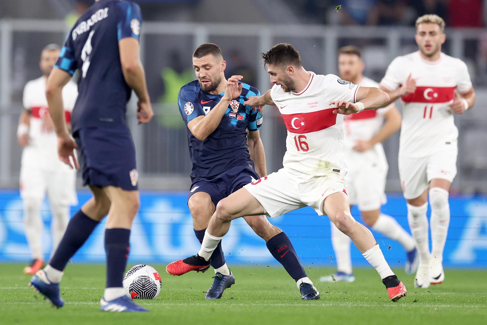 12.10.2023., Opus Arena, Osijek - Kvalifikacije za UEFA Europsko prvenstvo 2024., skupina D, 7. kolo, Hrvatska - Turska. Mateo Kovacic, Ismail Yuksek Photo: Igor Kralj/PIXSELL