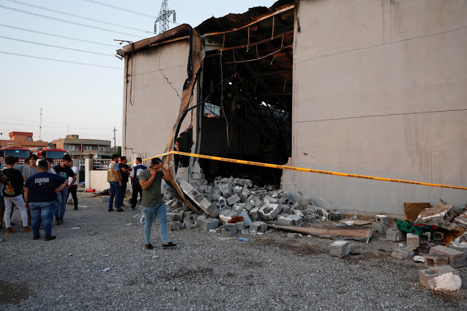 People gather at the site following a fatal fire at a wedding celebration, in the district of Hamdaniya in Iraq's Nineveh province, Iraq, September 27, 2023. REUTERS/Khalid Al-Mousily Photo: KHALID AL-MOUSILY/REUTERS