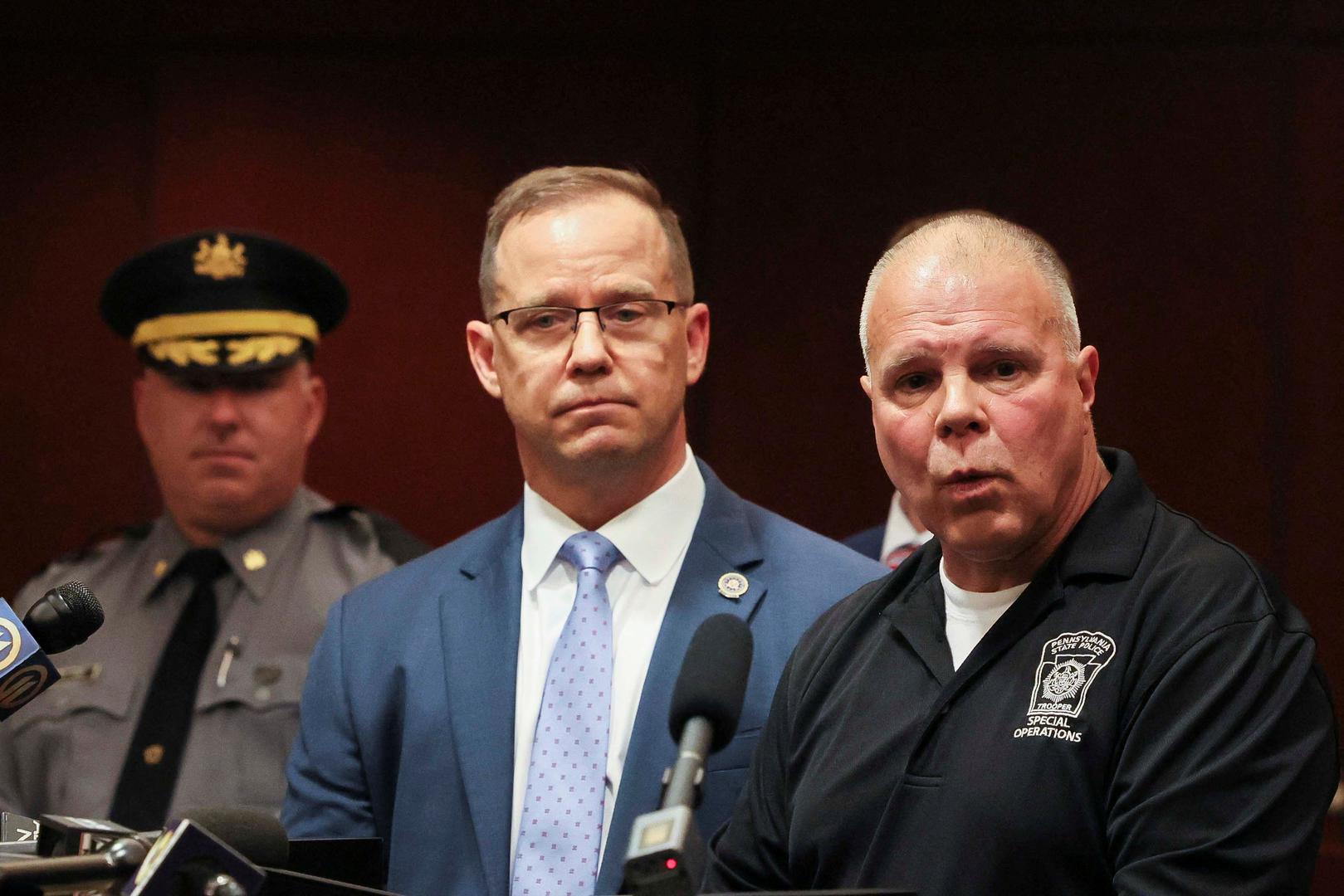 Deputy Commissioner of Operations Lieutenant Colonel George Bivens speaks as Kevin Rojek, special agent in charge of the FBI Pittsburgh field office and Pennsylvania State Police Colonel Christopher Paris look on during a press conference after Republican presidential candidate and former U.S. President Donald Trump was injured when shots were fired during a campaign rally, at a police station in Butler, Pennsylvania, U.S., July 13, 2024. REUTERS/Brendan McDermid Photo: BRENDAN MCDERMID/REUTERS