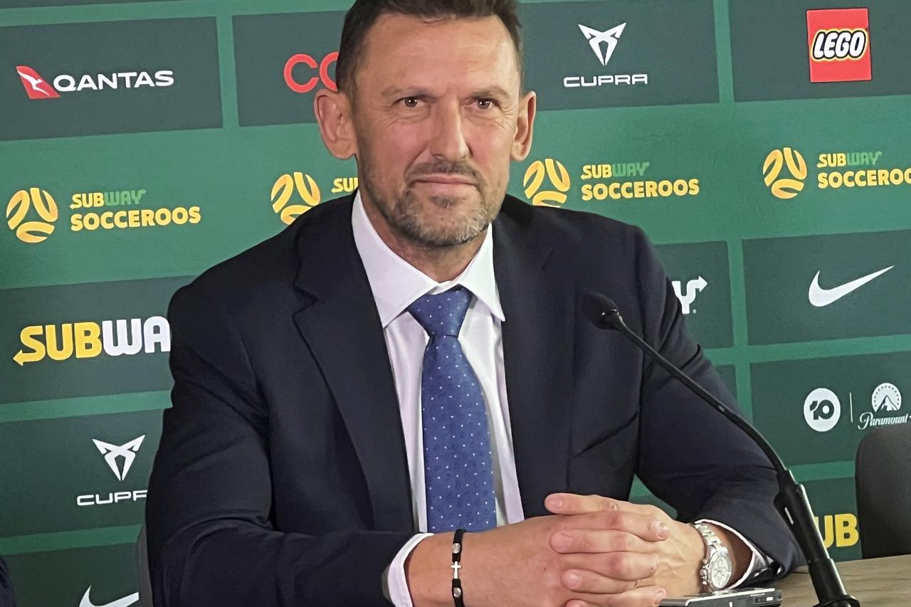 Tony Popovic addresses the media after being named the new coach of the Australia national soccer team, in Sydney