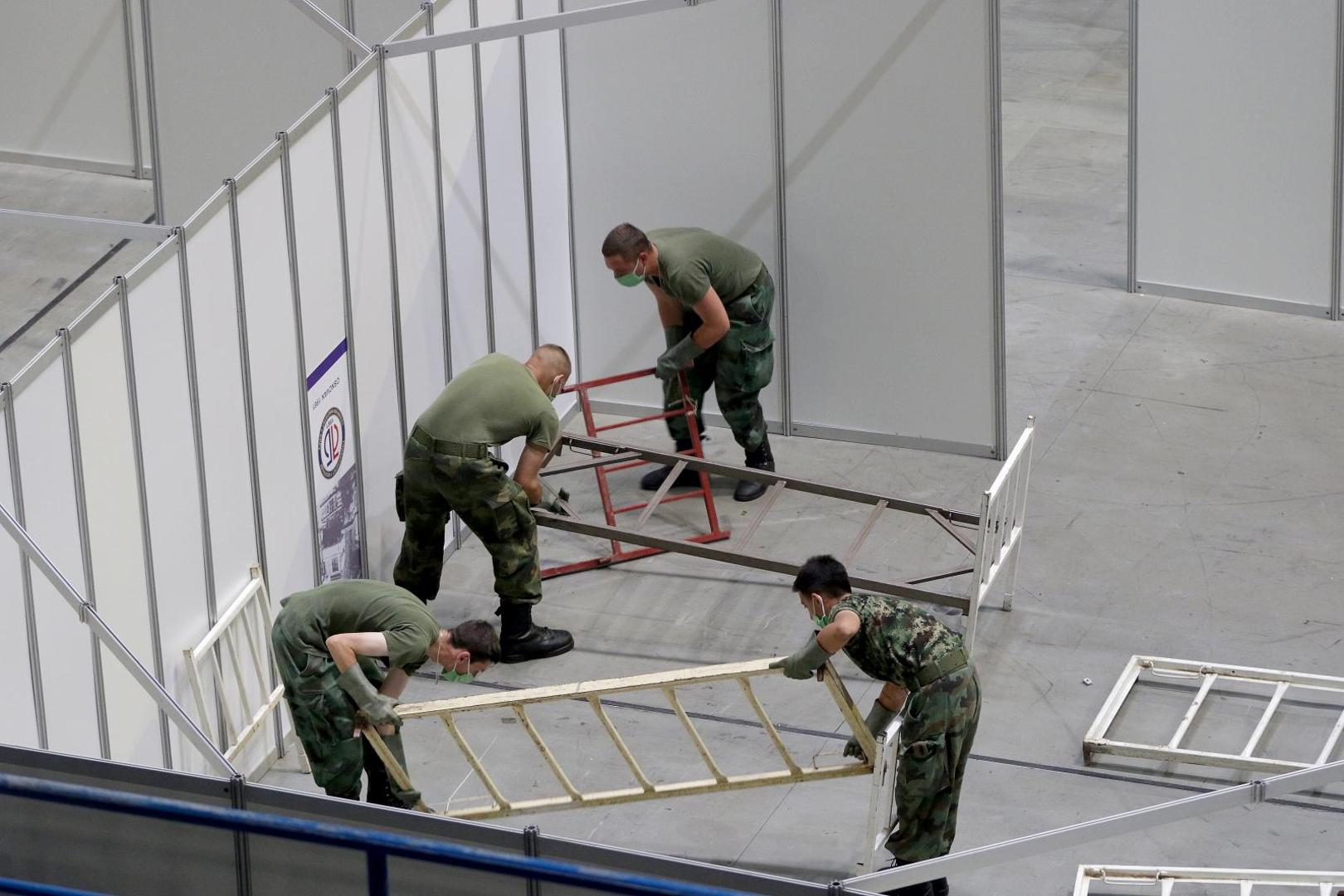 06, July, 2020, Belgrade - The Ministry of Health and the Army of the Republic of Serbia are setting up military beds in the Stark Arena to form a temporary covid hospital for people who have mild symptoms of the coronavirus. Photo: Antonio Ahel/ATAImages/PIXSELL

06, jul,2020, Beograd - Ministarstvo zdravlja i Vojska Republike Srbije namestaju vojne krevete u Stark areni za formiranje privremene kovid bolnice za ljude koji imaju blaze simtome korona virusa. Photo: Antonio Ahel/ATAImages/PIXSELL