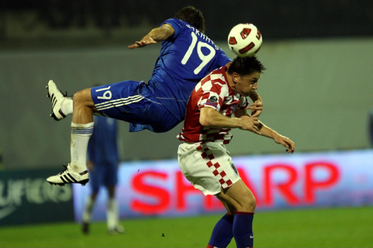 \'07.09.2010., Zagreb - Kvalifikacijska utakmica za Europsko prvenstvo 2012. godine.Hrvatska - Grcka. Ivica Olic i Sokratis Papastathopoulos.  Photo: Zeljko Hladika/PIXSELL\'