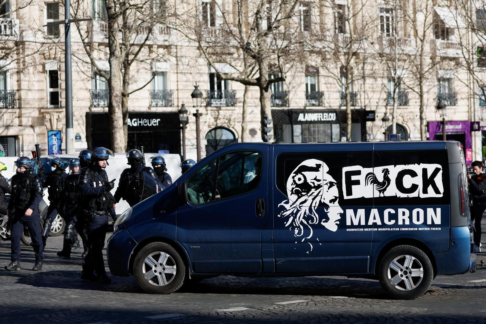 SENSITIVE MATERIAL. THIS IMAGE MAY OFFEND OR DISTURB    A camper van drives on the Champs-Elysees avenue as cars parade during their "Convoi de la liberte" (The Freedom Convoy), a vehicular convoy to protest coronavirus disease (COVID-19) vaccine and restrictions in Paris, France, February 12, 2022. REUTERS/Benoit Tessier Photo: BENOIT TESSIER/REUTERS