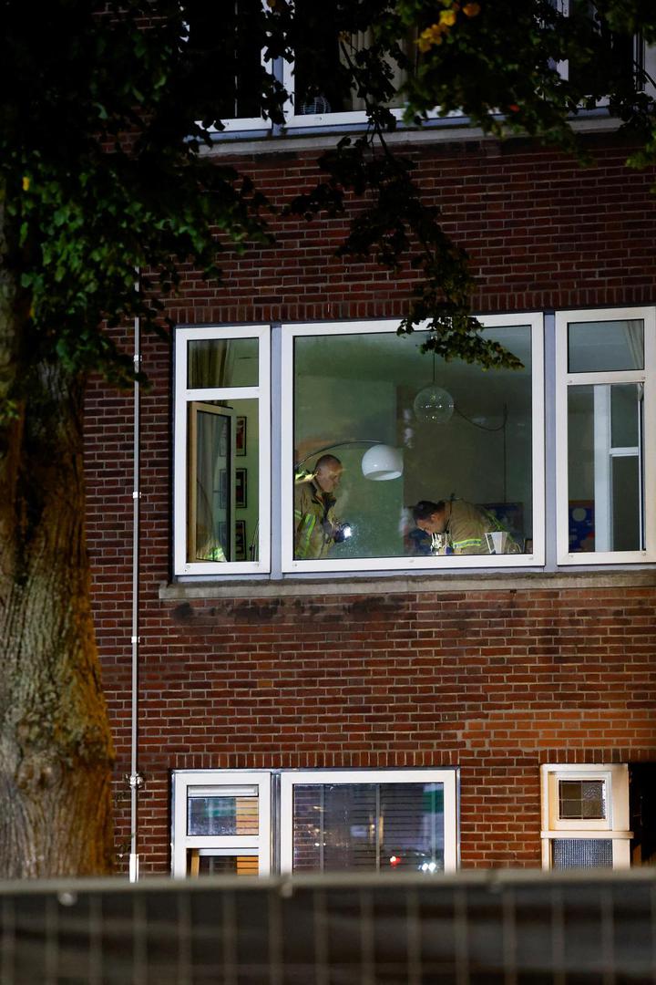 Firefighters work at the house of a victim of a shooting in Rotterdam, Netherlands, September 28, 2023. REUTERS/Piroschka van de Wouw Photo: Piroschka van de Wouw/REUTERS