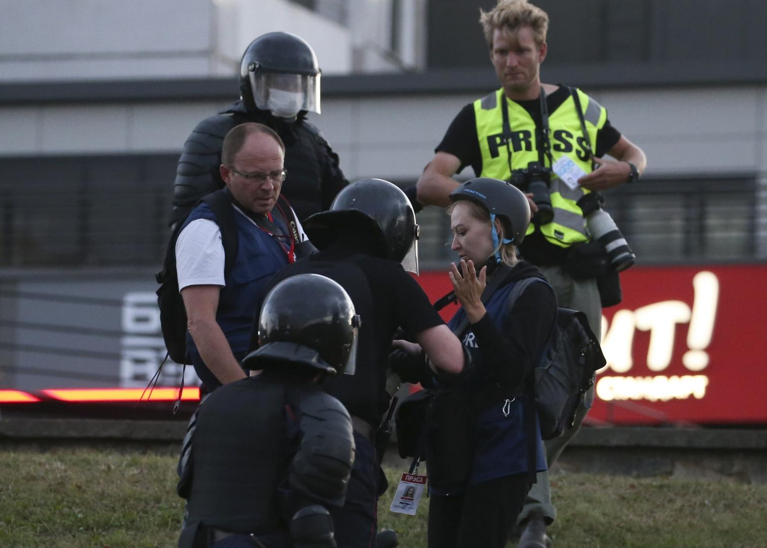 MINSK, BELARUS - AUGUST 11, 2020: Riot police officers and journalists during a protest against the results of the 2020 Belarusian presidential election. Mass protests erupted in major cities across Belarus in the evening of August 9. Natalia Fedosenko/TASS Photo via Newscom Newscom/PIXSELL