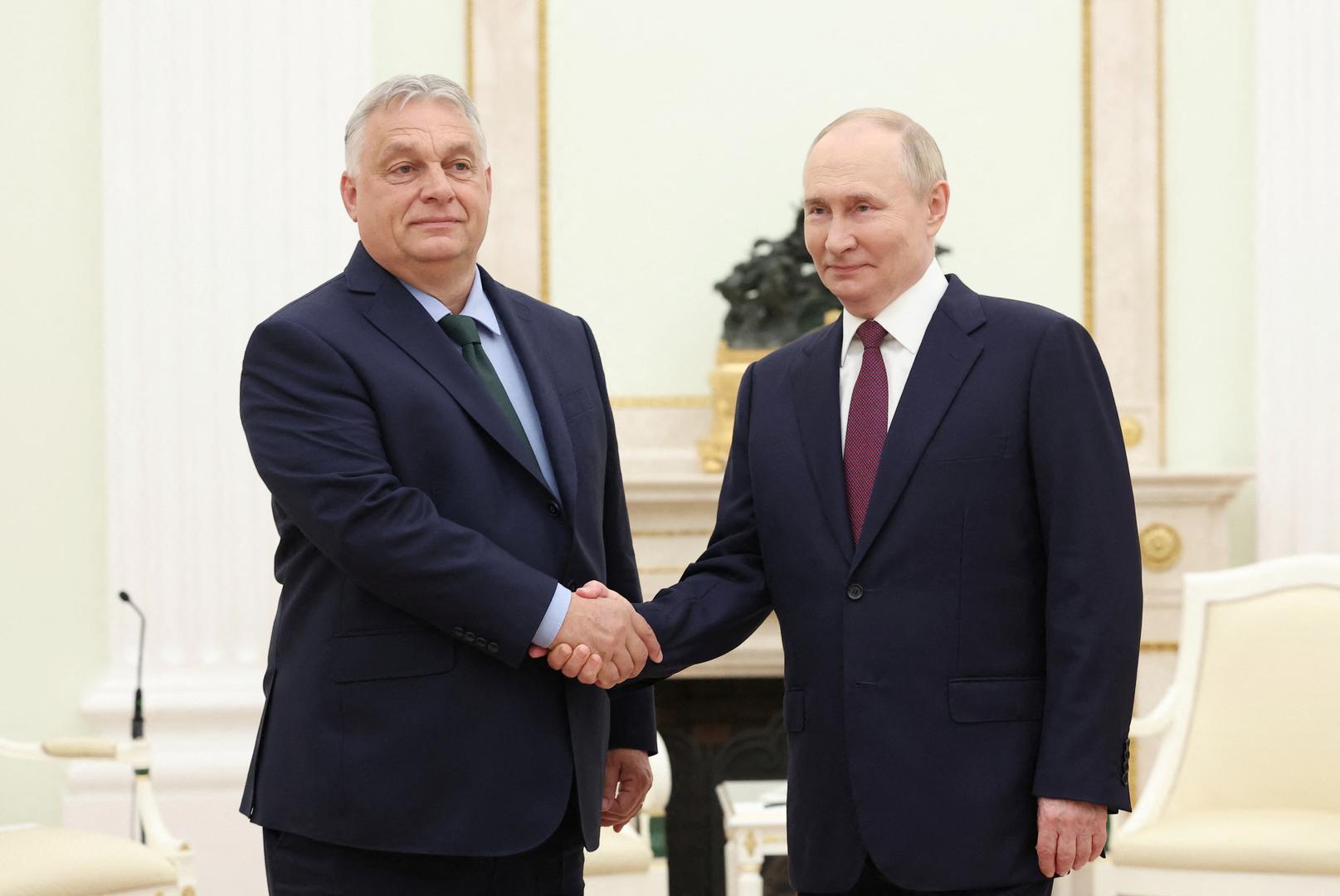 Russia's President Vladimir Putin shakes hands with Hungary's Prime Minister Viktor Orban during a meeting at the Kremlin in Moscow, Russia July 5, 2024. Sputnik/Valeriy Sharifulin/Pool via REUTERS ATTENTION EDITORS - THIS IMAGE WAS PROVIDED BY A THIRD PARTY. Photo: Valeriy Sharifulin/REUTERS