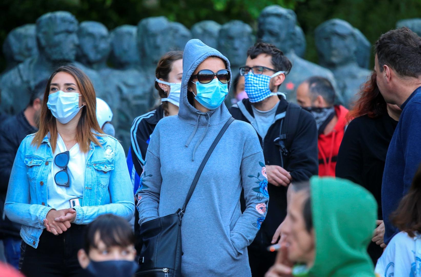 Protesters ride bicycles during an anti-government protest in Ljubljana Protesters wearing protective face masks attend an anti-government demonstration, as the spread of the coronavirus disease (COVID-19) continues, in Ljubljana, Slovenia May 8, 2020. REUTERS/Borut Zivulovic BORUT ZIVULOVIC