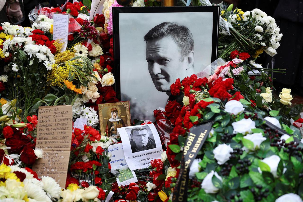 People mark first anniversary of Russian opposition leader Navalny's death at Moscow cemetery