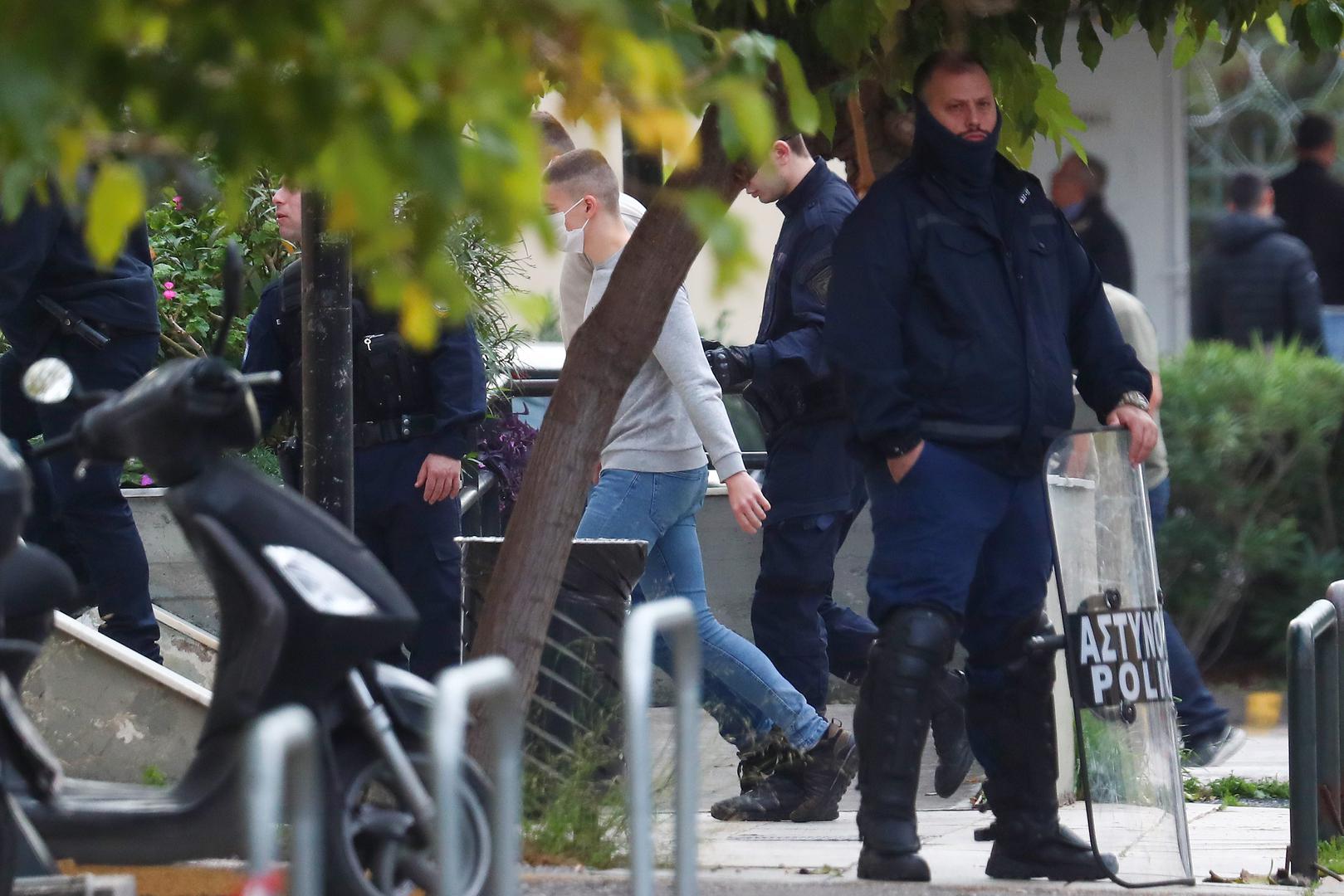 06.12.2023., Atena, Grcka - Policija dovodi na sud navijace Dinama, Bad Blue Boyse. Photo: Matija Habljak/PIXSELL