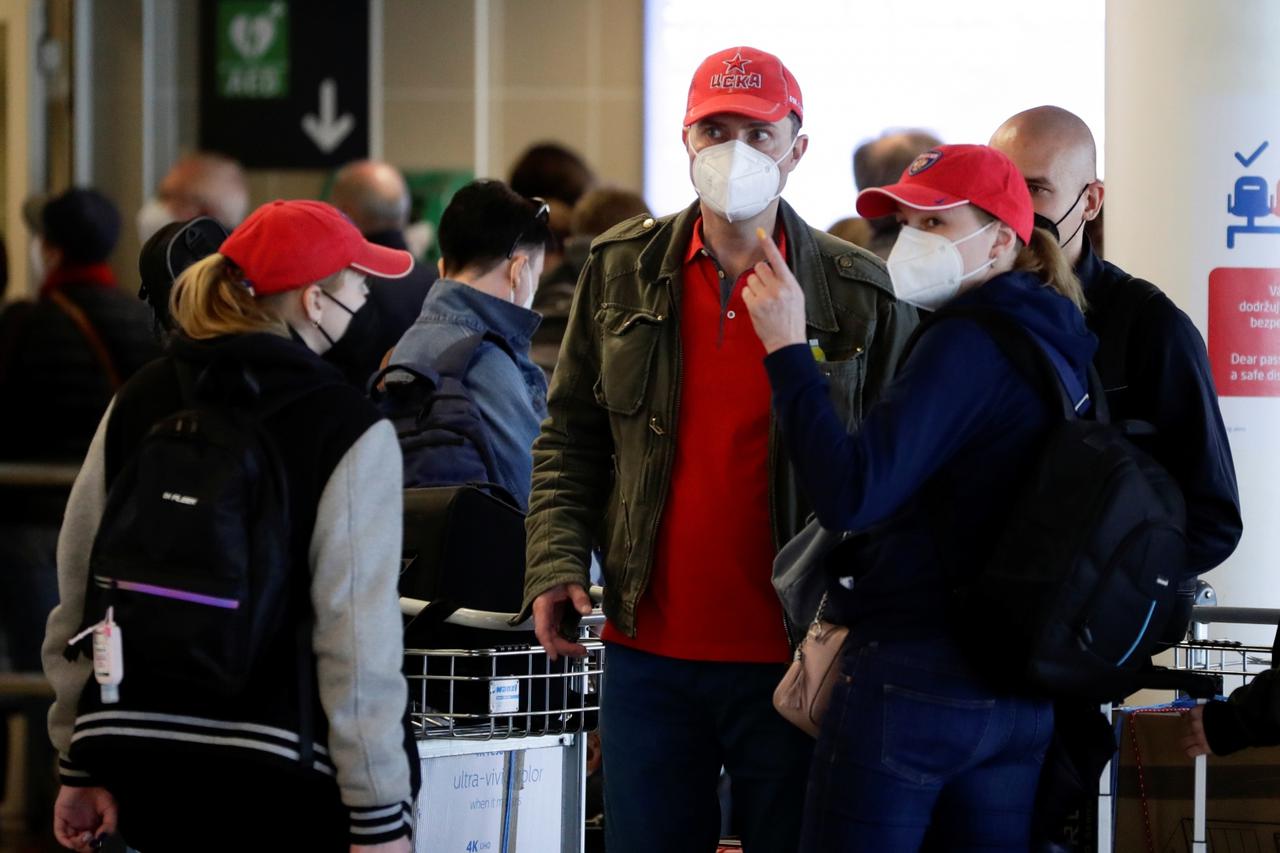 Passengers board a Russian government plane in Prague