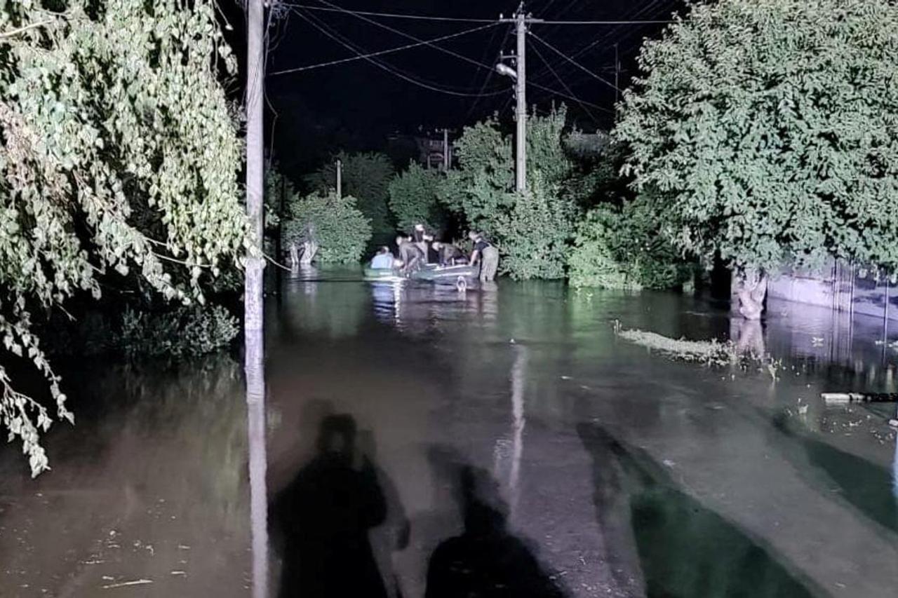 Ukrainian police patrol an area, as Russia's attack on Ukraine continues, in the town of Izium